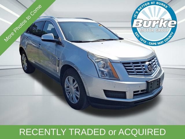 2016 Cadillac SRX Luxury Collection in Radiant Silver Metallic — front three-quarter view